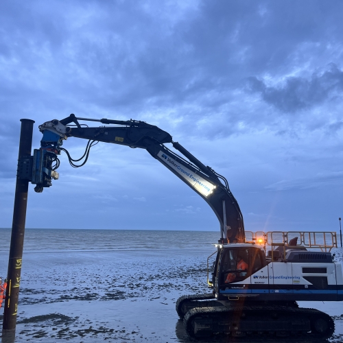 Man installing a pile
