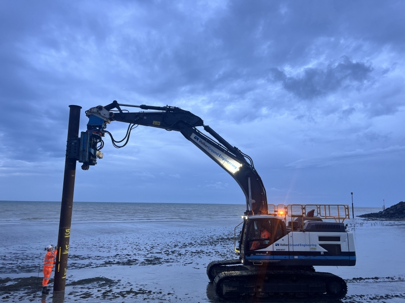 Man installing a pile